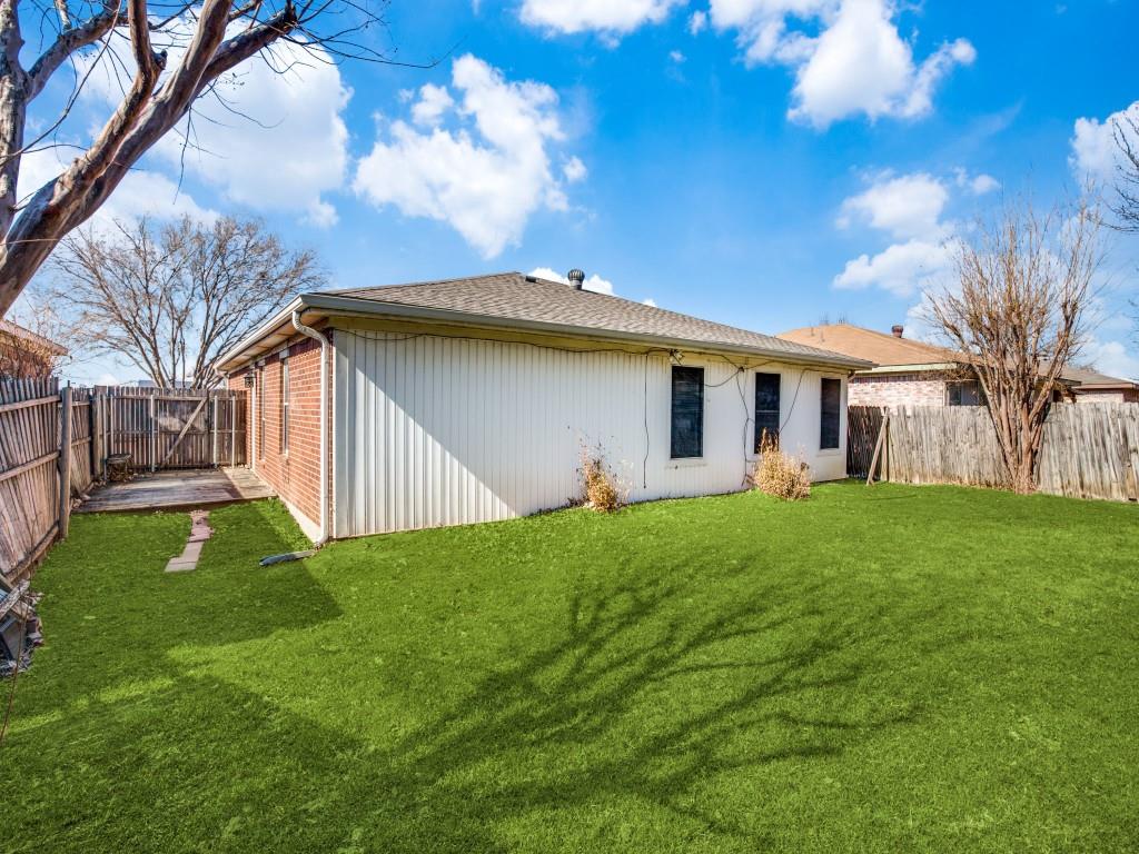 2097 Quarter Horse Lane Keller, TX 76248 - Photo 16 of 16 a view of a yard in front of house with a garden