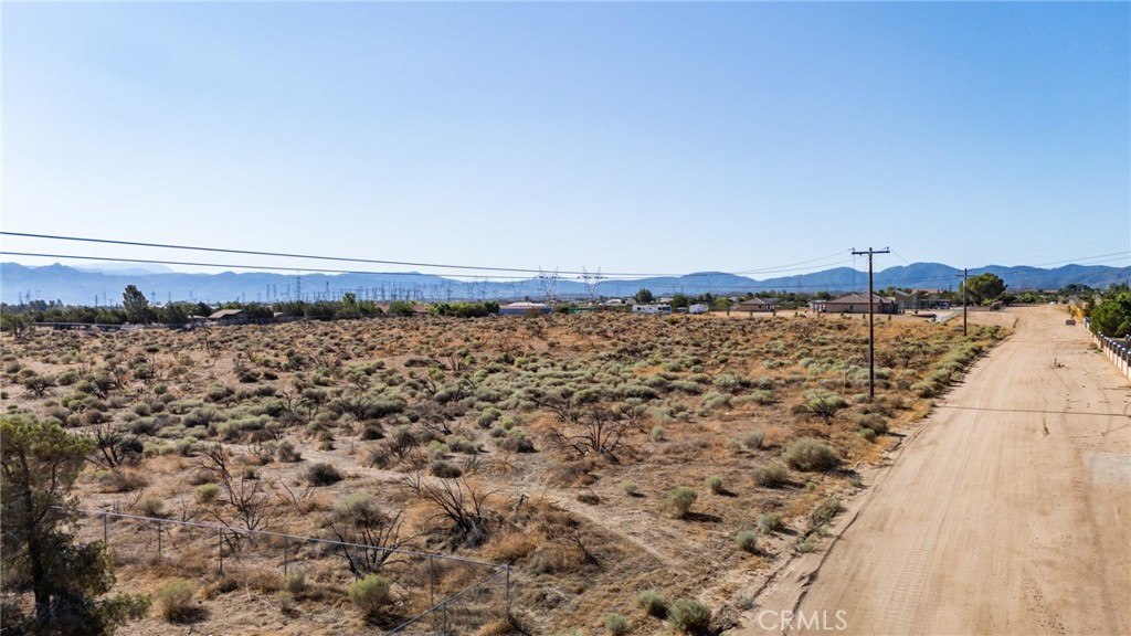44 Christina Road Oak Hills, CA 92344 - Photo 2 of 20 a view of a large body of water with a building in the background