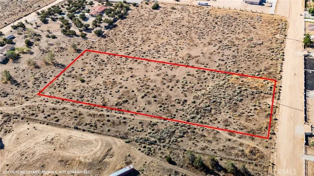 a view of a city with mountains in the background