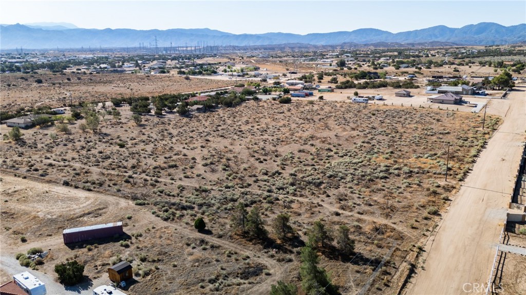 44 Christina Road Oak Hills, CA 92344 - Photo 4 of 20 a view of a city with mountains in the background