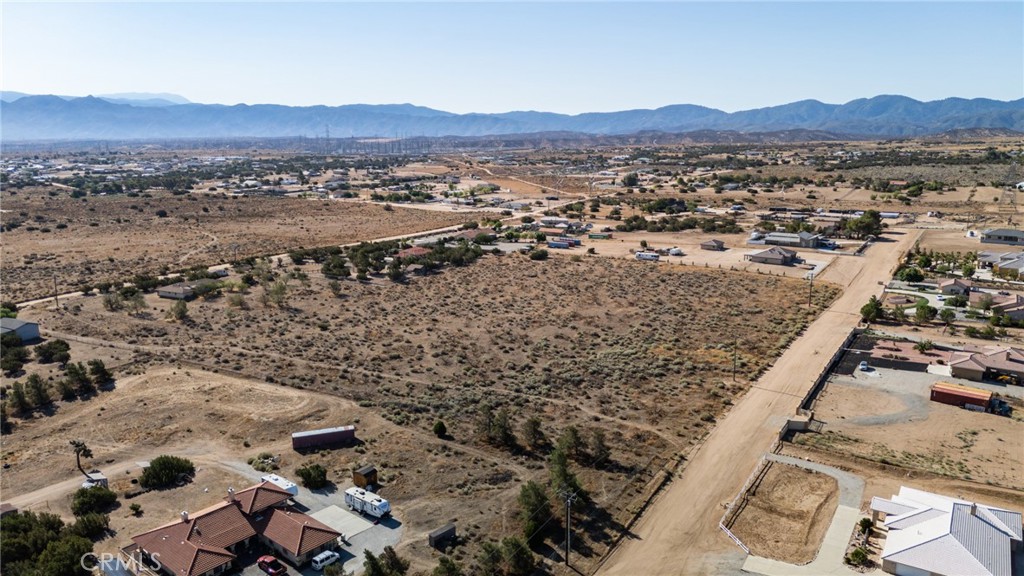 44 Christina Road Oak Hills, CA 92344 - Photo 5 of 20 an aerial view of residential house and sandy dunes