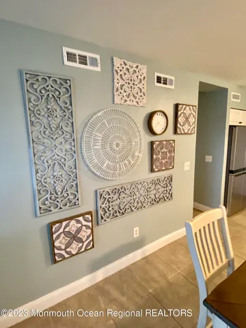 a view of washer and flat screen tv