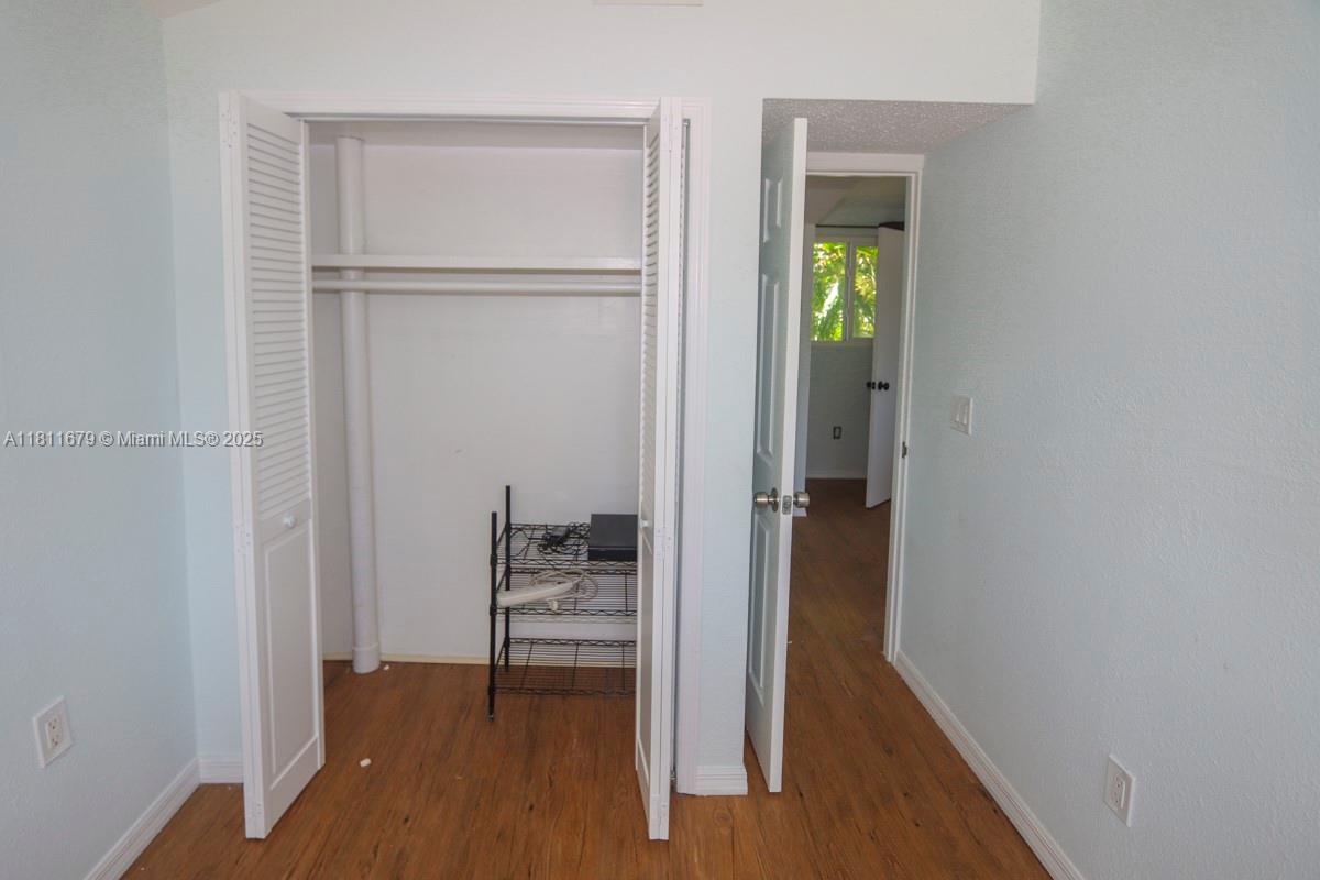 812 Chukker Road, Unit 3 Delray Beach, FL 33483 - Photo 12 of 20 a view of front door with wooden floor