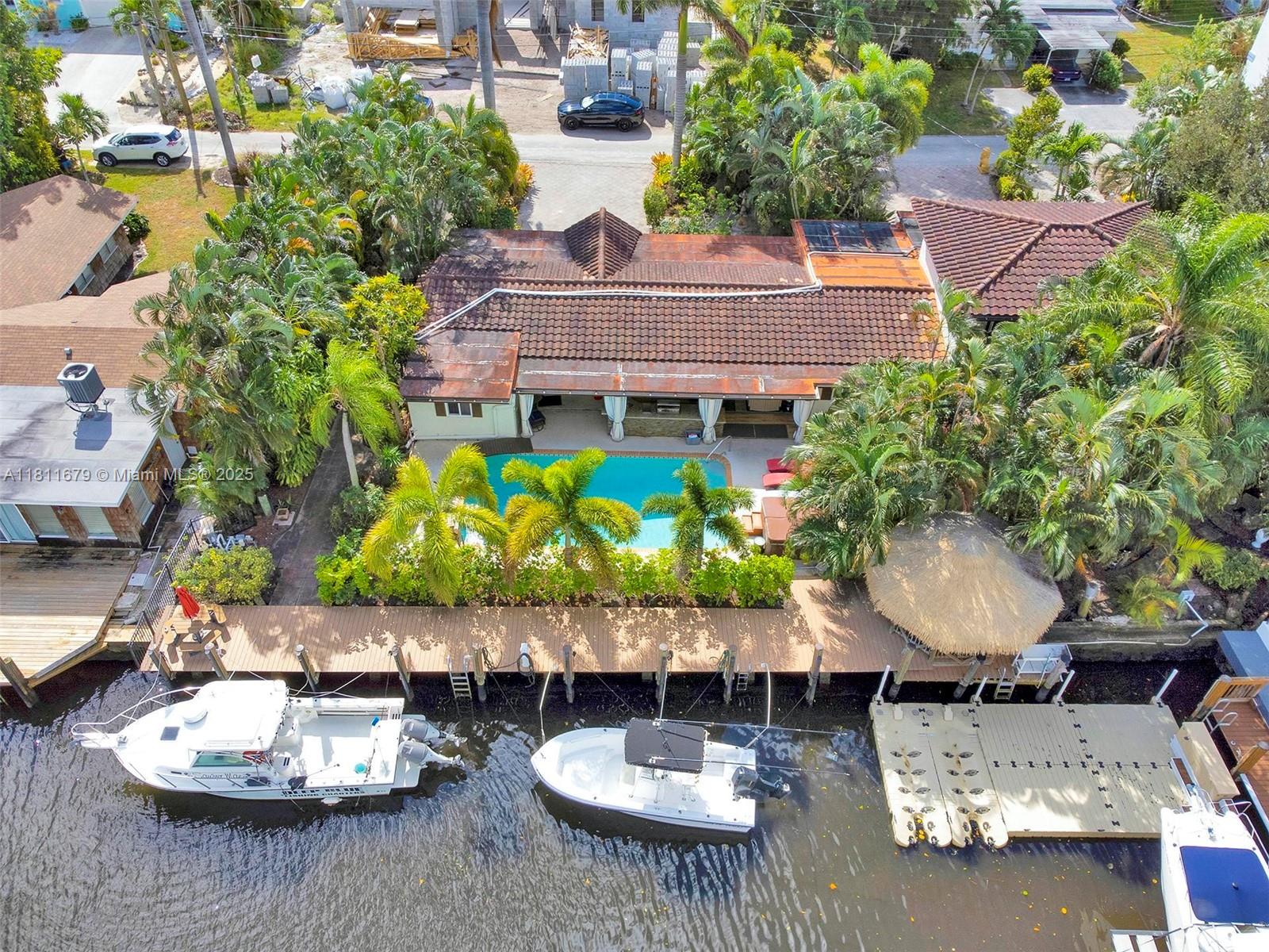 812 Chukker Road, Unit 3 Delray Beach, FL 33483 - Photo 20 of 20 a view of a patio with chairs and plants