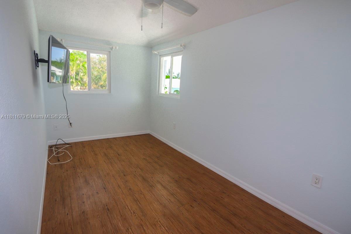 812 Chukker Road, Unit 3 Delray Beach, FL 33483 - Photo 9 of 20 an empty room with windows