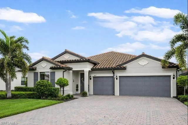 front view of a house with a garden