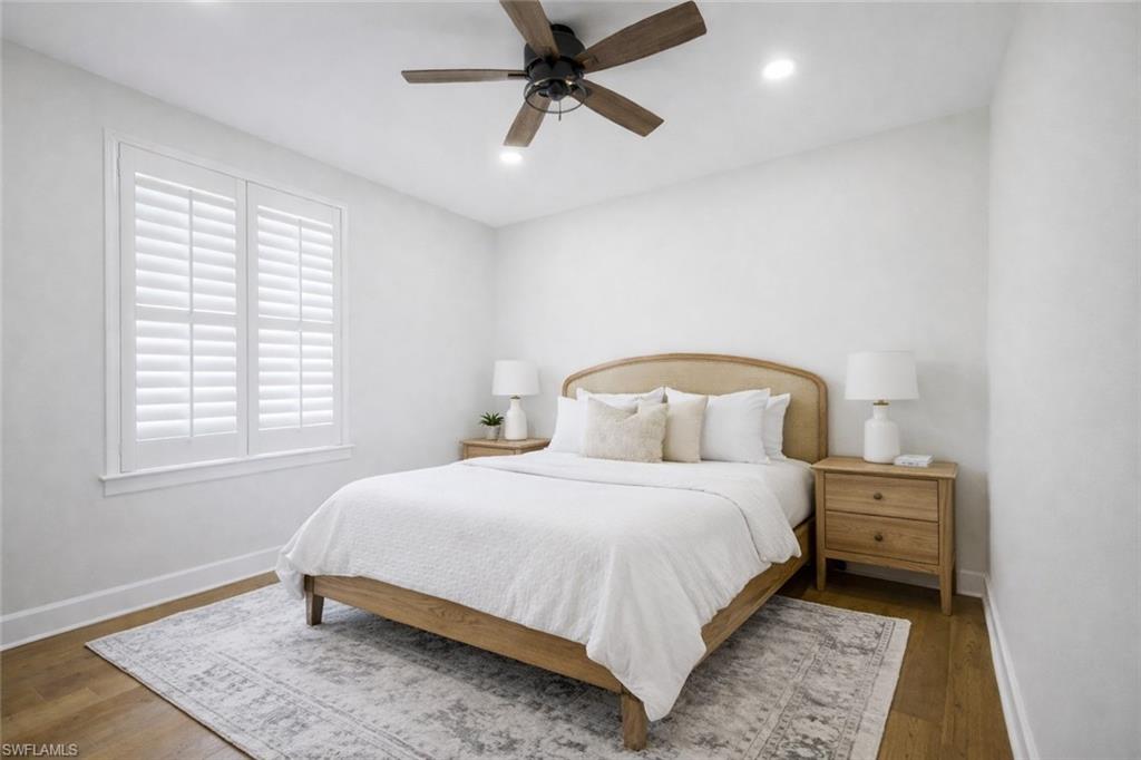 19837 Beverly Park Road Estero, FL 33928 - Photo 25 of 39 a bedroom with a bed and a window