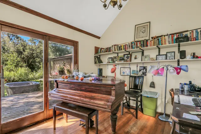 a room with furniture and a wooden floor