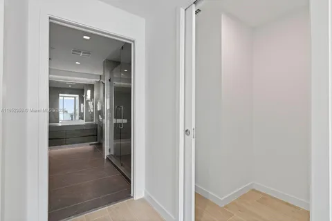 a bathroom with a sink a toilet a mirror and vanity