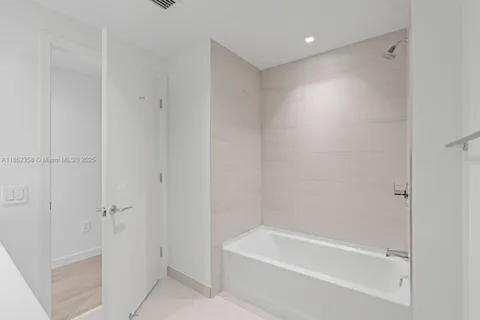 a dining table with chairs and wooden floor