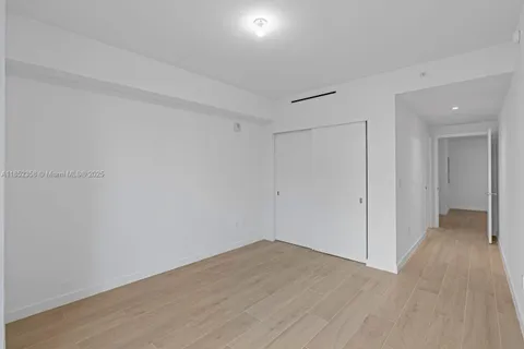 a view of a swimming pool with a yard