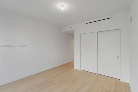 a front view of a building with street view