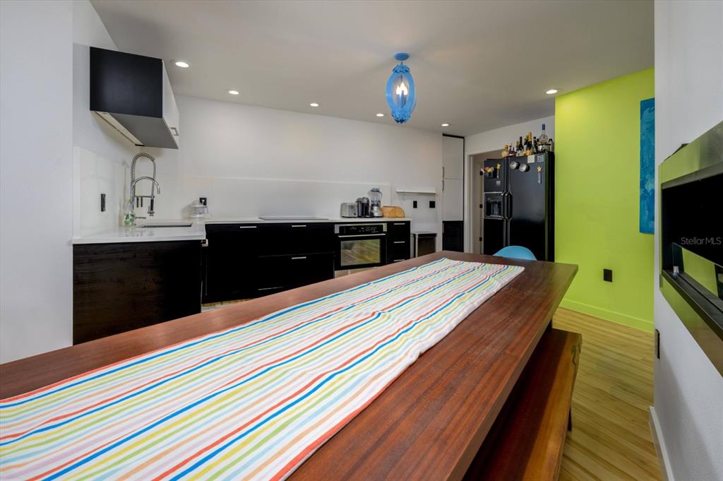 29318 Whippoorwill Lane Wesley Chapel, FL 33543 - Photo 8 of 38 a bed room with a bed and a television