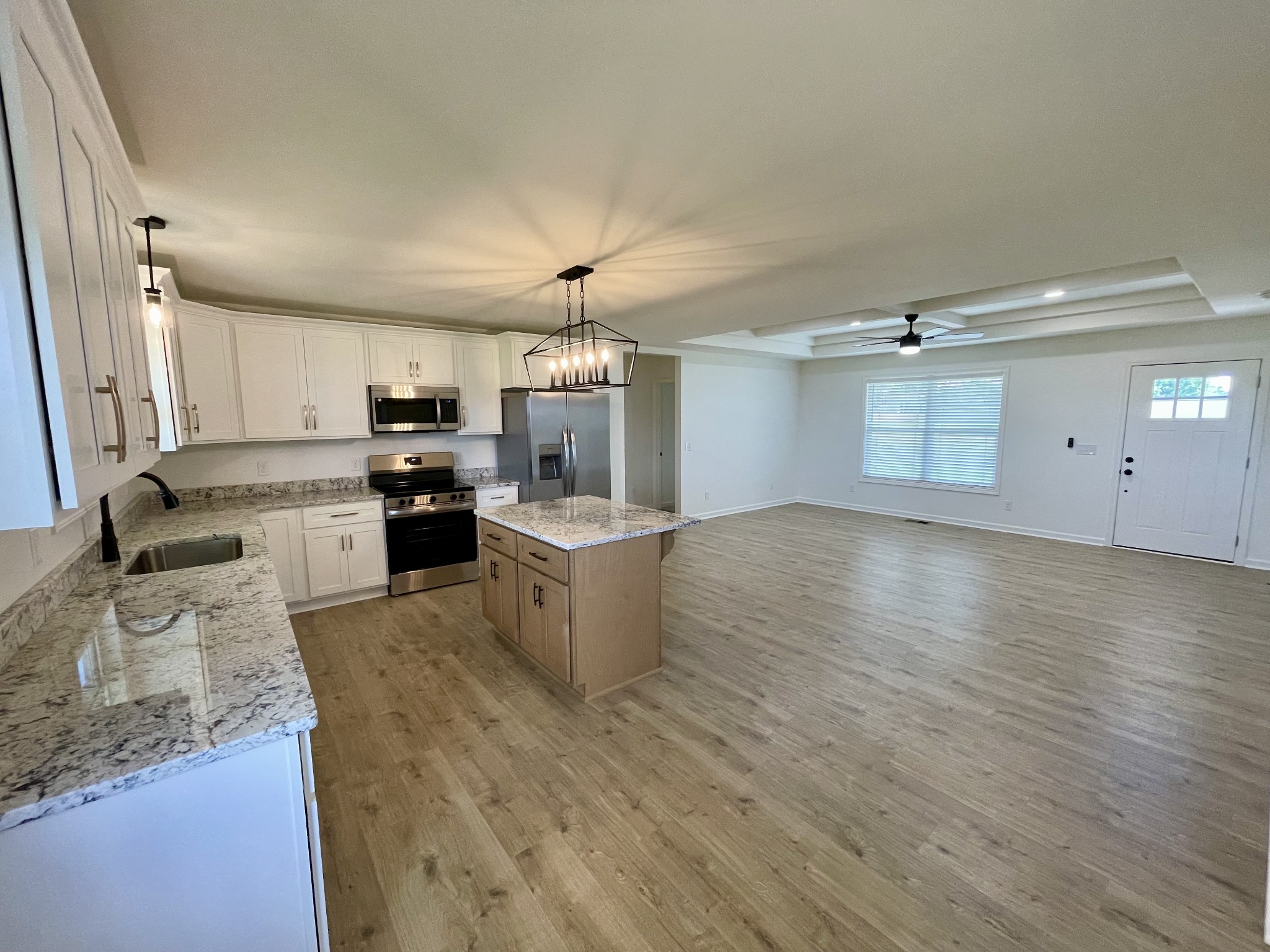 104 Donald Road Lafayette, TN 37083 - Photo 10 of 22 a kitchen with a sink appliances and cabinets