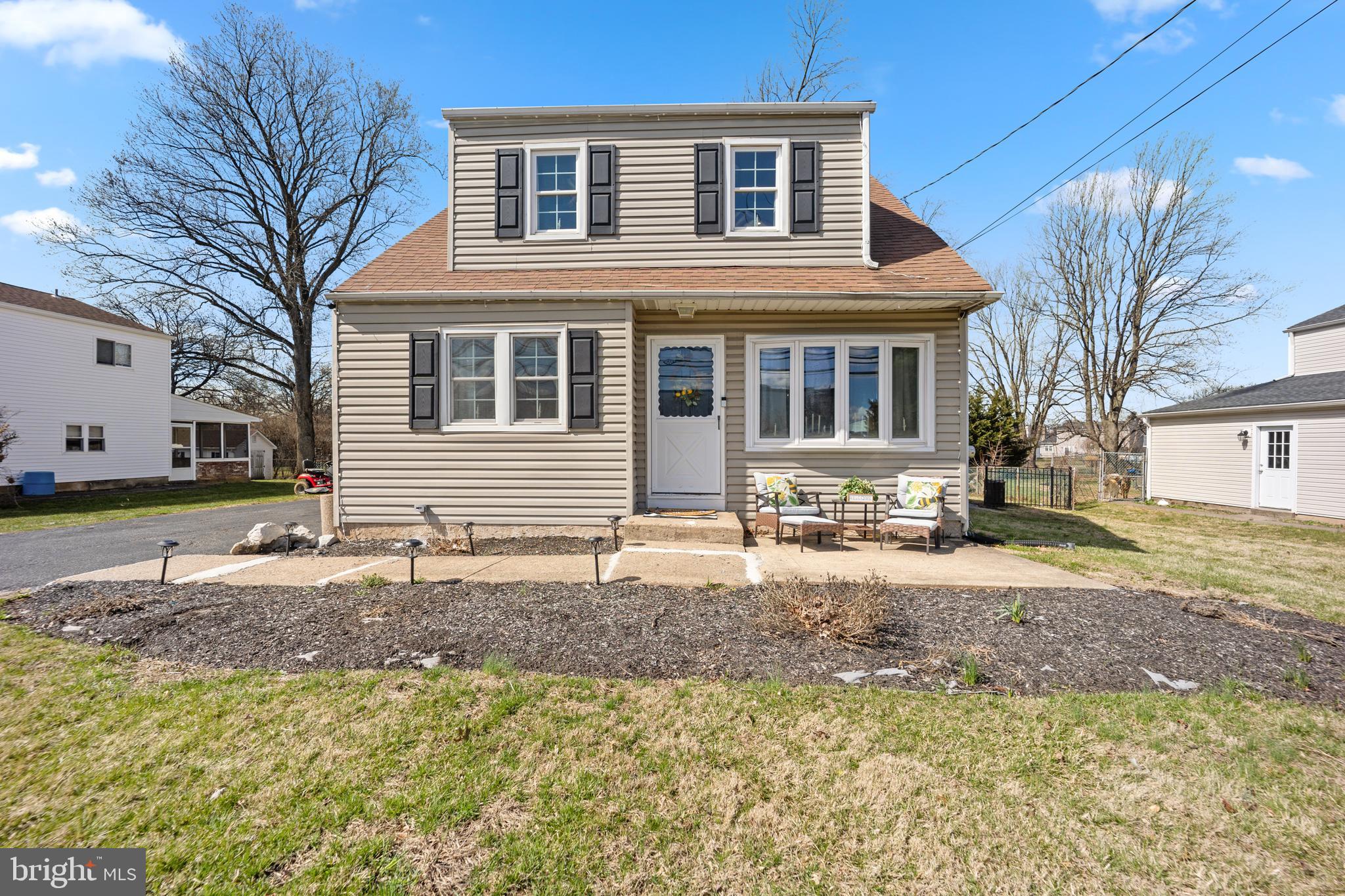 1012 Mearns Road Warminster, PA 18974 - Photo 1 of 28 a front view of a house with a yard