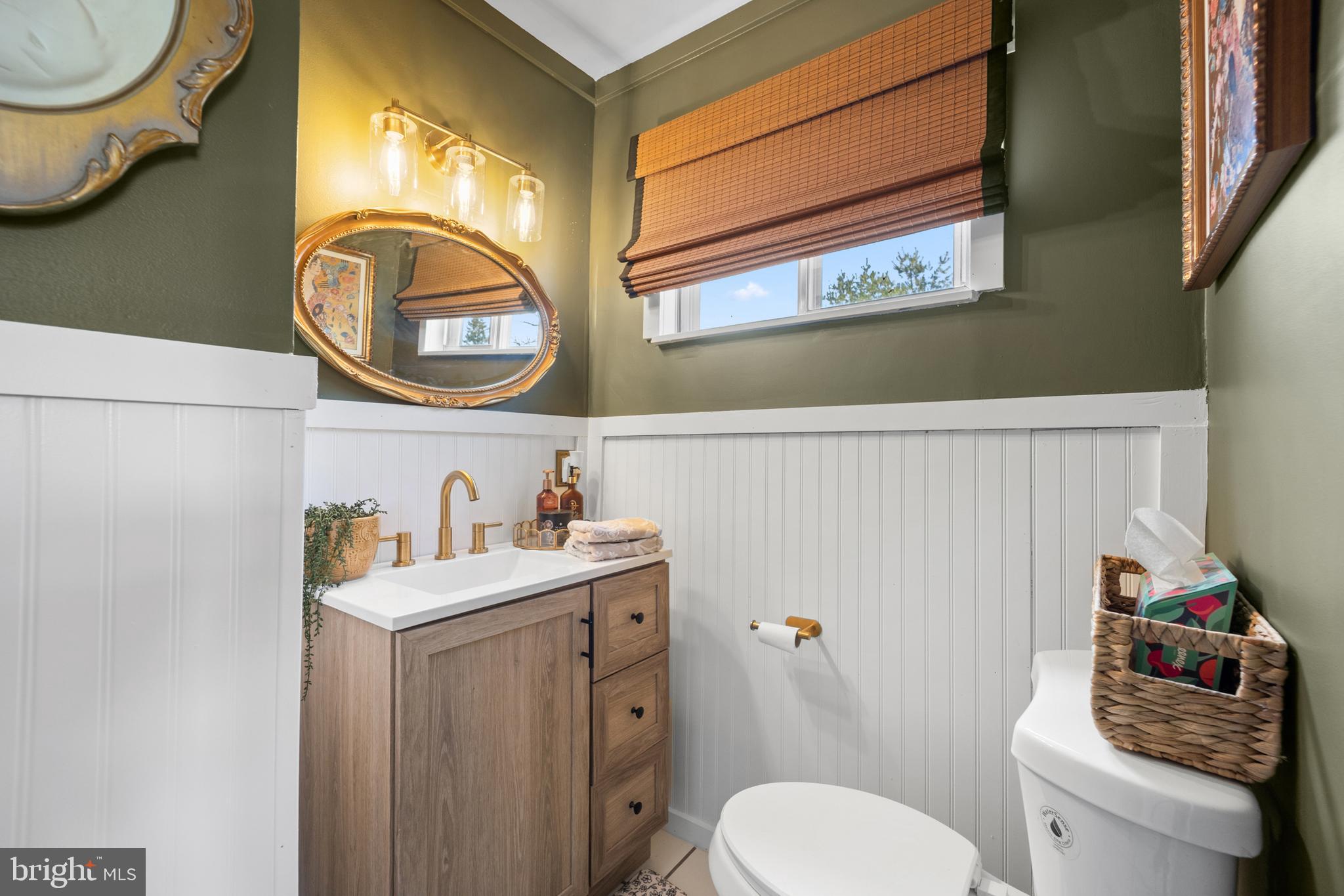 1012 Mearns Road Warminster, PA 18974 - Photo 13 of 28 a bathroom with a sink a toilet and a mirror