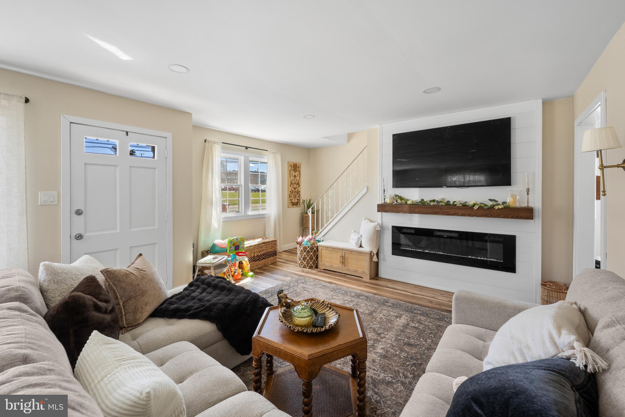 1012 Mearns Road Warminster, PA 18974 - Photo 5 of 28 a living room with furniture and a flat screen tv