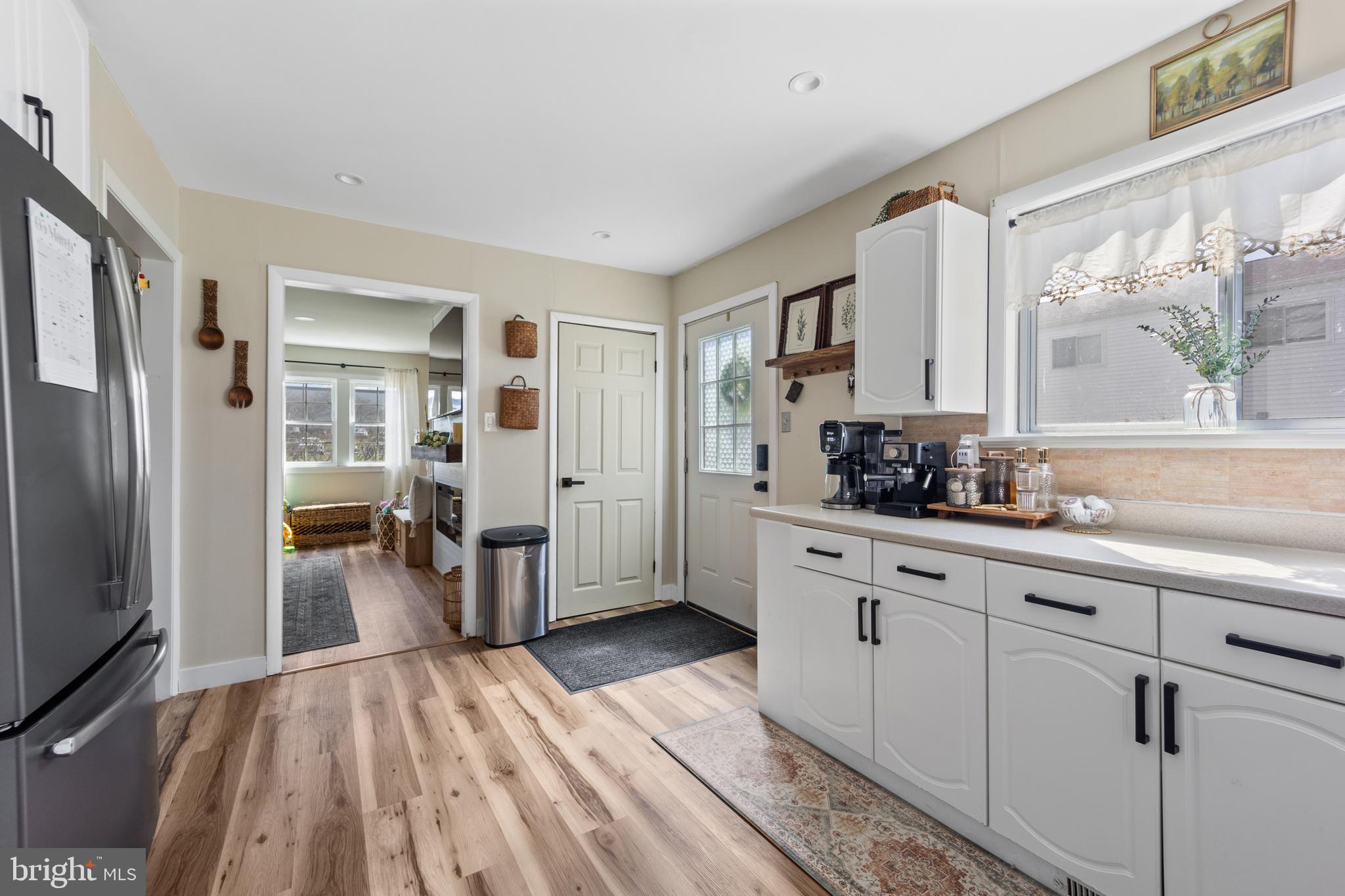 1012 Mearns Road Warminster, PA 18974 - Photo 9 of 28 a kitchen with stainless steel appliances granite countertop a refrigerator and a sink