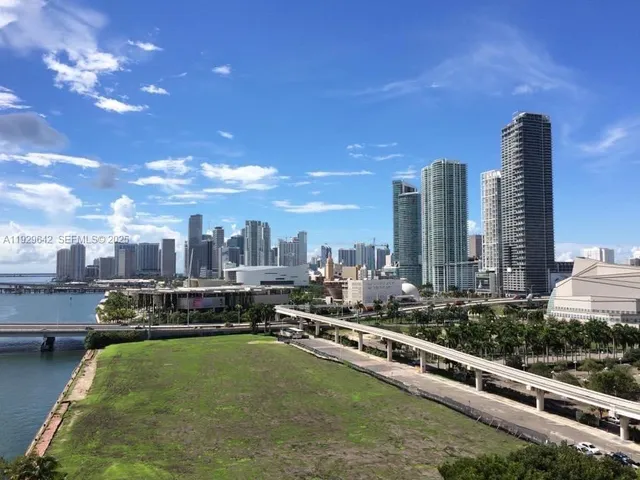 a view of a city with tall buildings