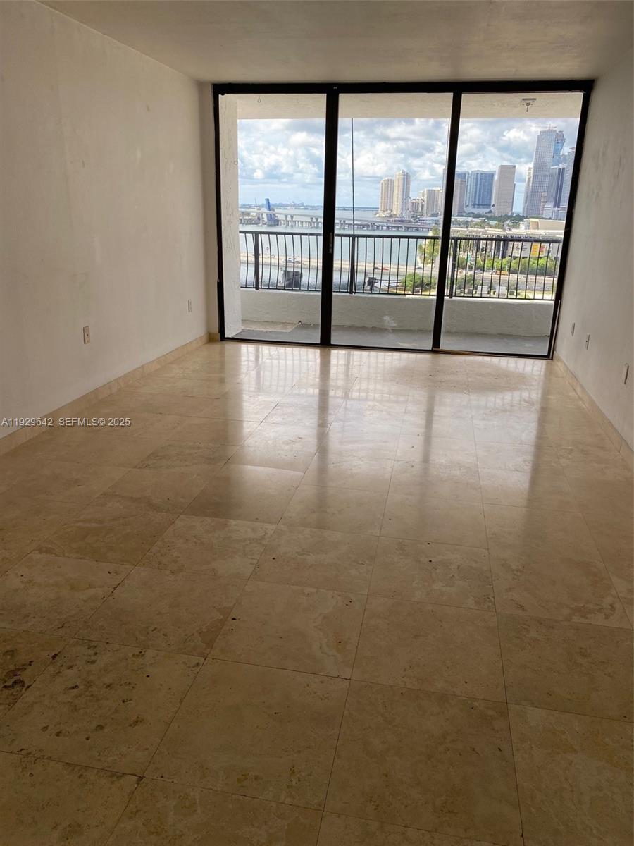 555 Northeast 15th Street, Unit 14K Miami, FL 33132 - Photo 26 of 47 a view of an empty room with a window