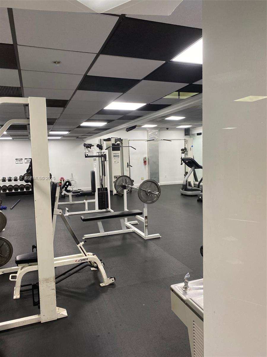 555 Northeast 15th Street, Unit 14K Miami, FL 33132 - Photo 29 of 47 a view of a room with gym equipment