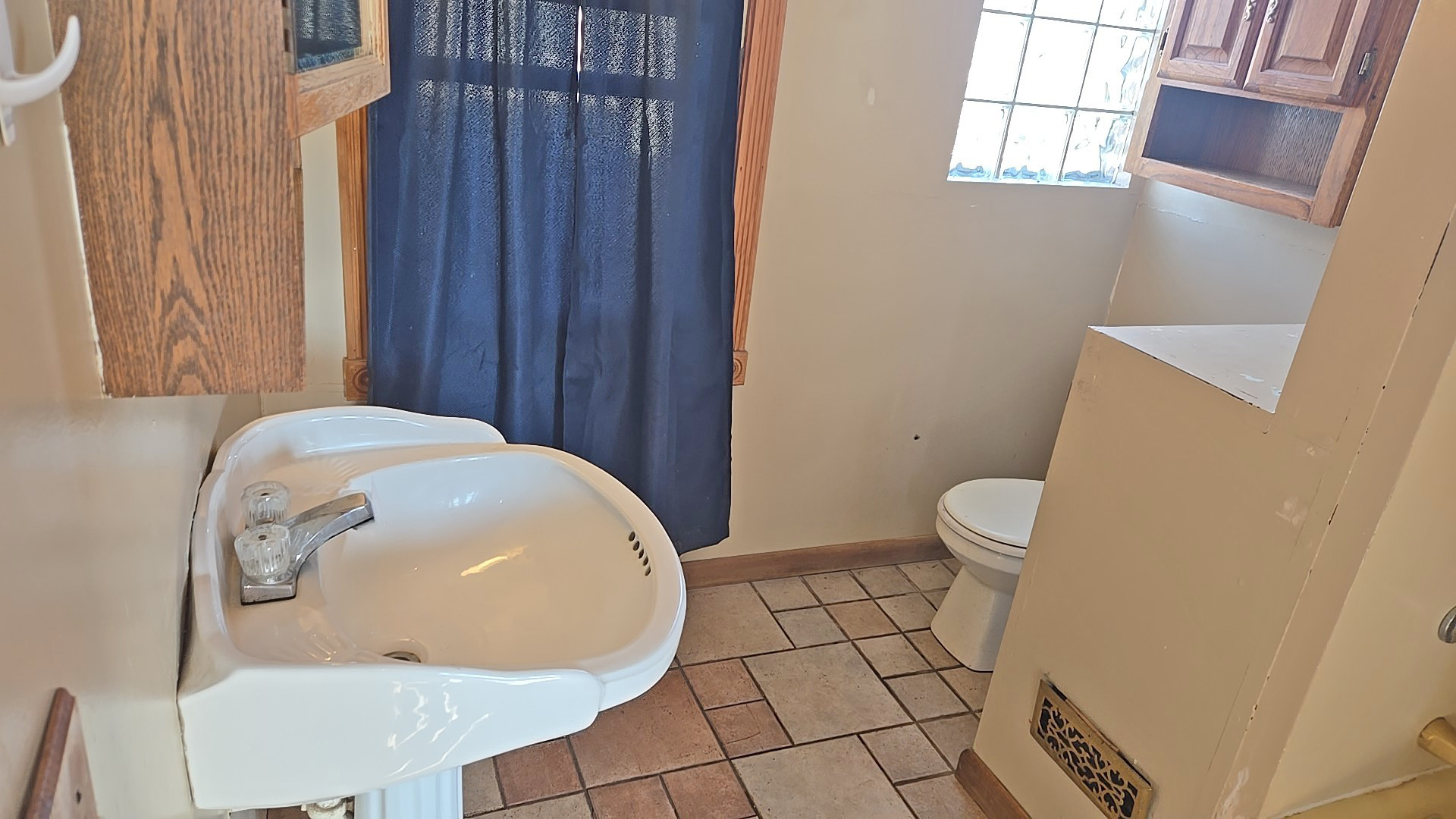 3417 Butler Avenue Steger, IL 60475 - Photo 11 of 22 a bathroom with a toilet and a mirror