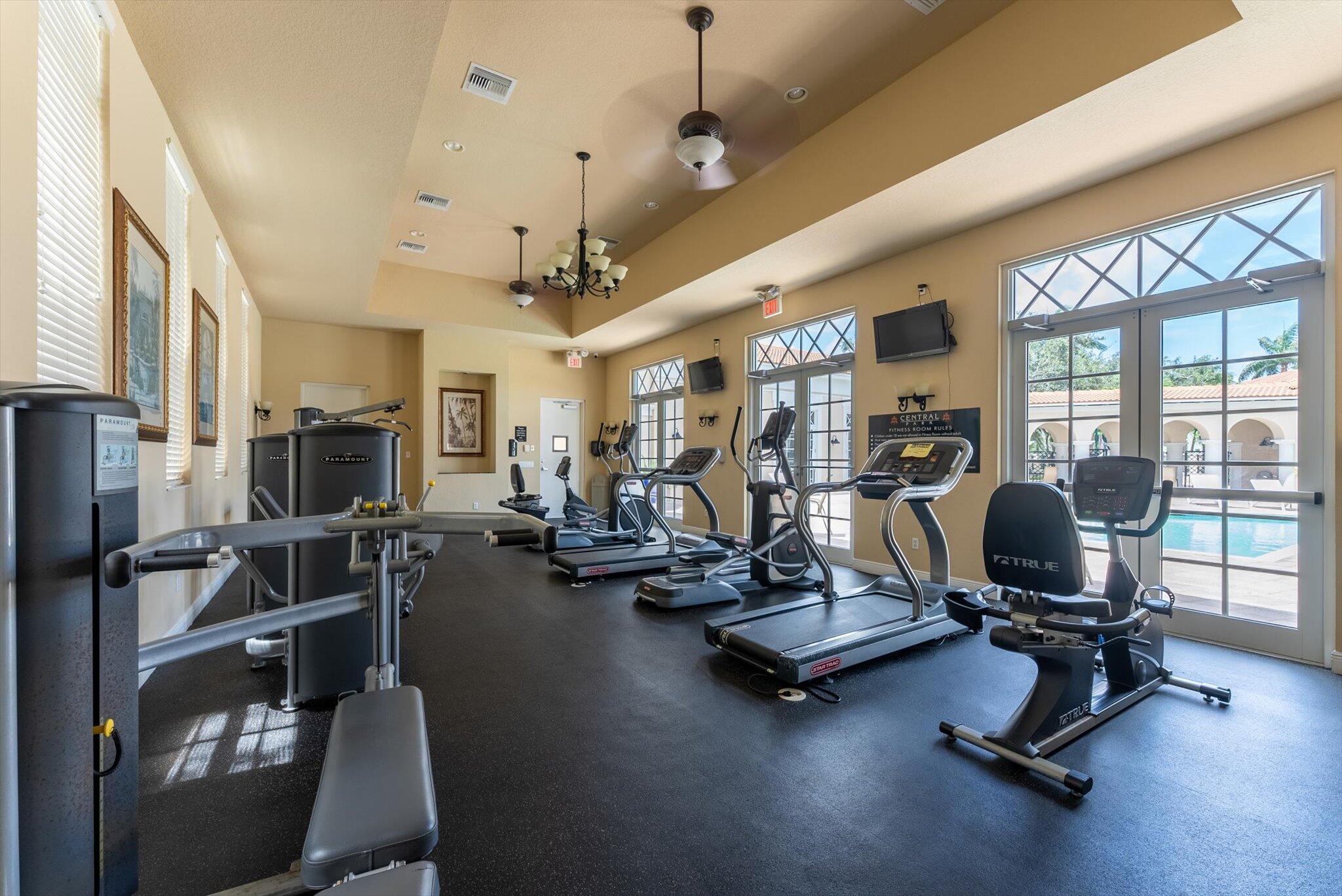 806 Northwest 83rd Lane Boca Raton, FL 33487 - Photo 31 of 37 a view of a room with gym equipment