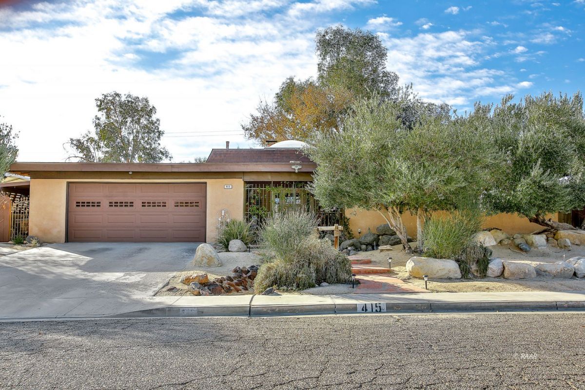 415 West Howell Avenue Ridgecrest, CA 93555 - Photo 1 of 1 front view of a house with a yard