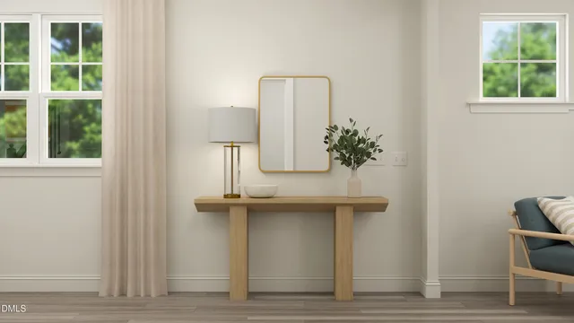 a view of entryway with wooden floor