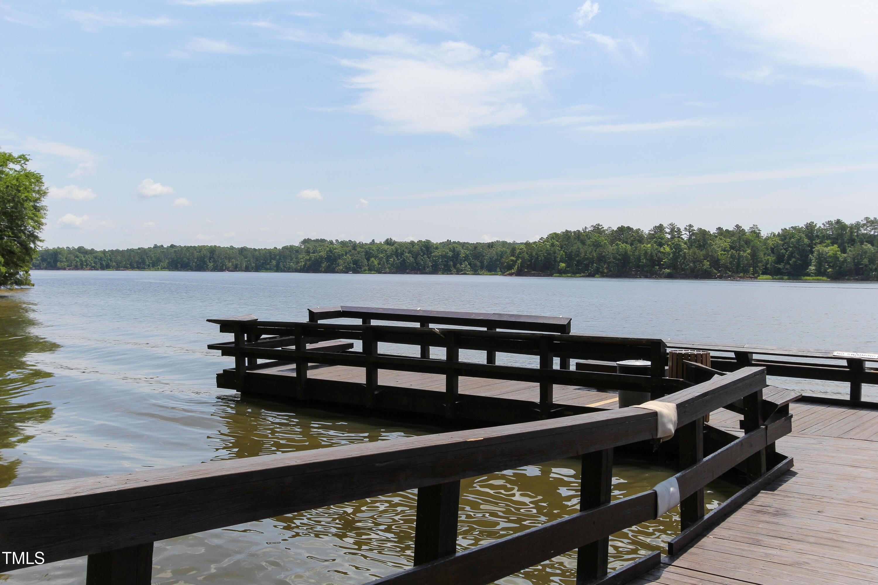360 Calvander Lane Apex, NC 27539 - Photo 28 of 35 a view of a lake from a balcony