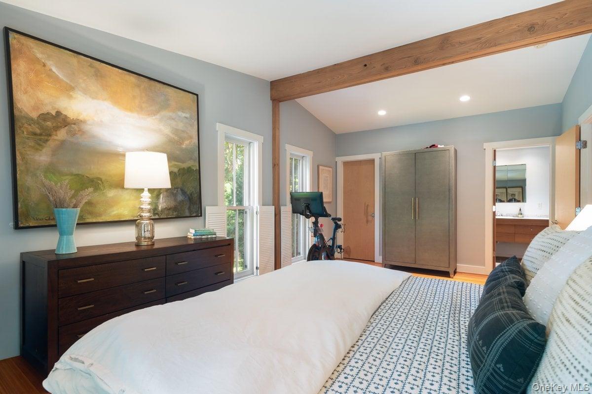 1821 Spring Valley Road Ossining, NY 10562 - Photo 30 of 48 A walk-in closet and en suite bath enhance the charm of the primary bedroom.