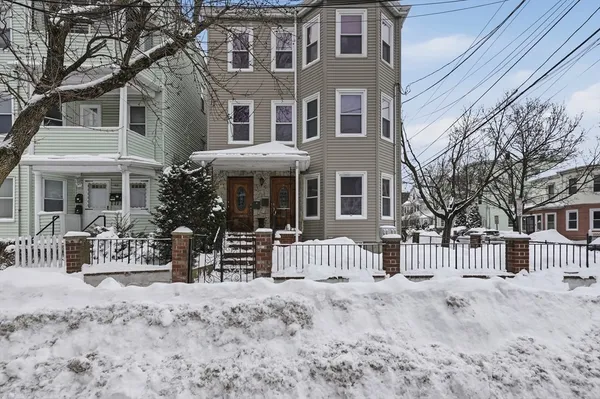 a front view of a house with a porch