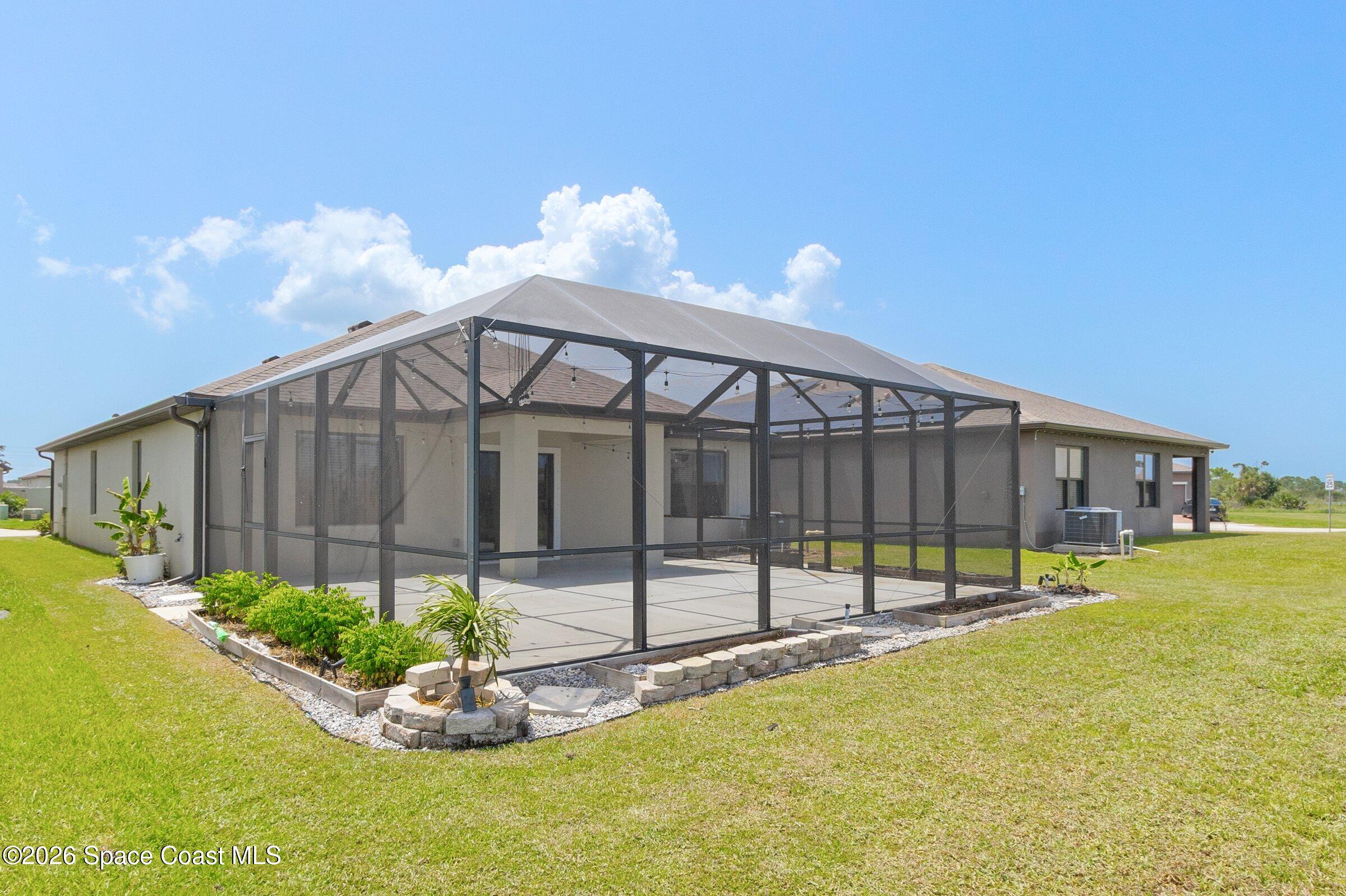3419 Foggy Mist Road Southeast Palm Bay, FL 32909 - Photo 25 of 39 Screened Lanai