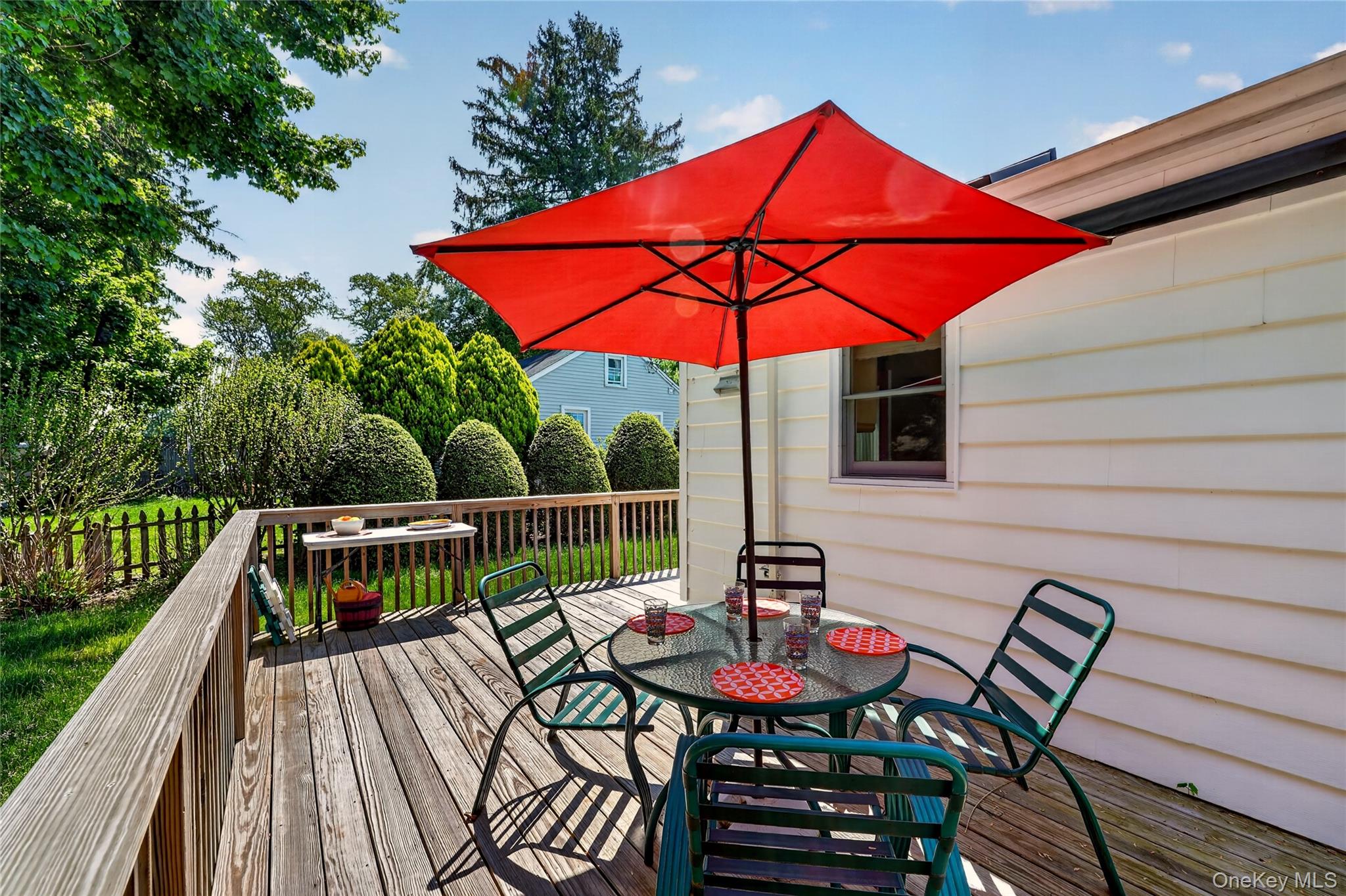 232 Cherry Road Yorktown Heights, NY 10598 - Photo 16 of 21 a view of balcony with furniture and umbrella