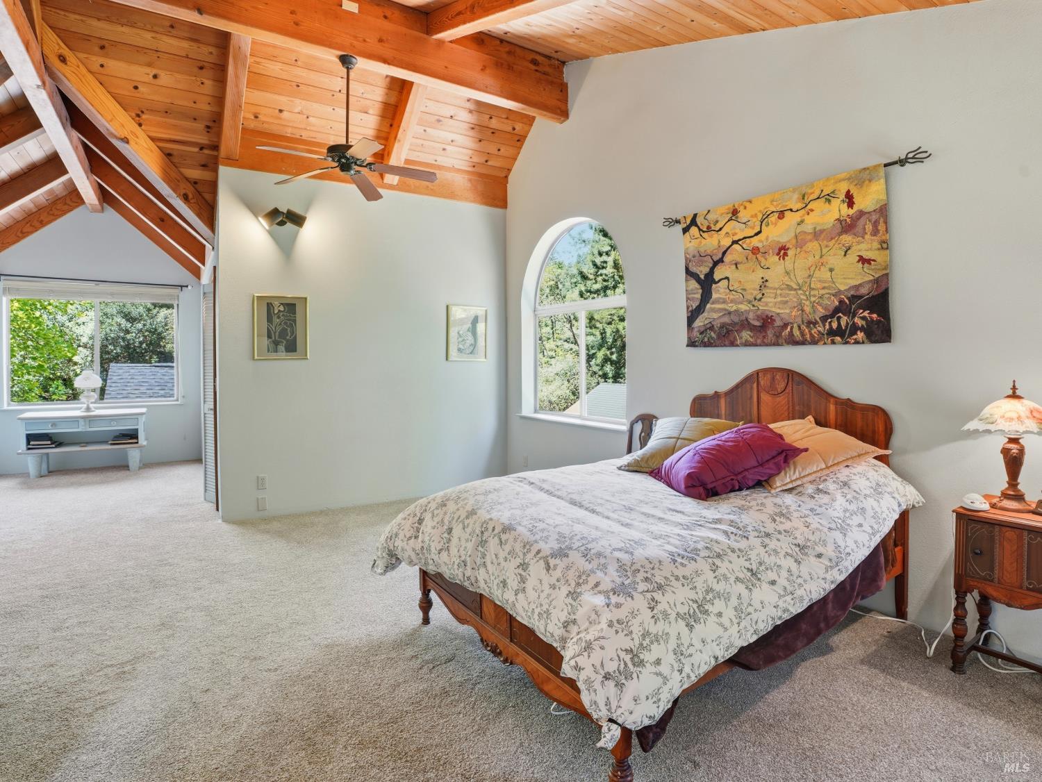 31397 Seaview Road Cazadero, CA 95421 - Photo 21 of 47 a bedroom with a bed and window