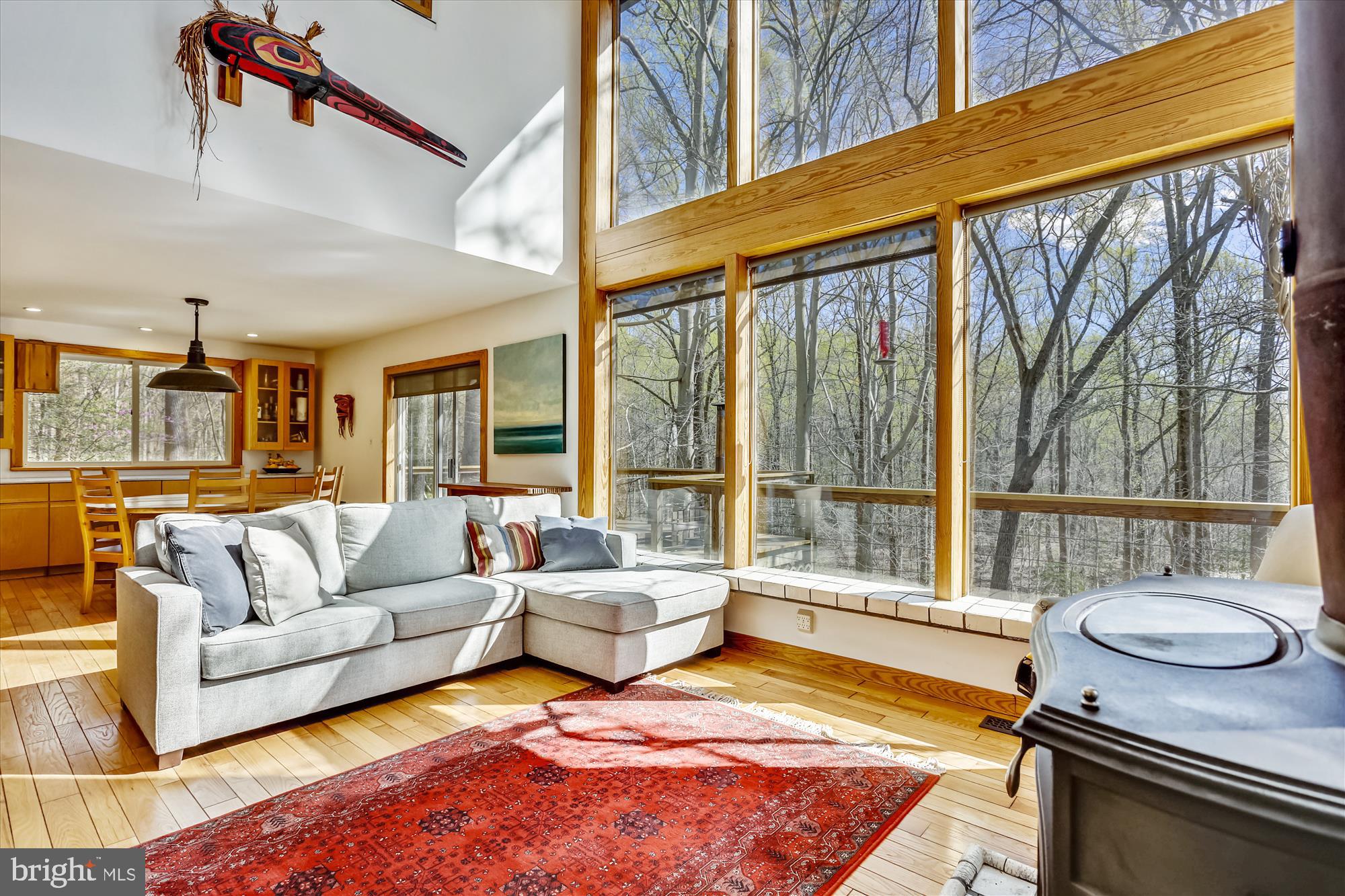 6840 Steamboat Landing Road Accokeek, MD 20607 - Photo 31 of 66 Vaulted ceiling and a wall of windows