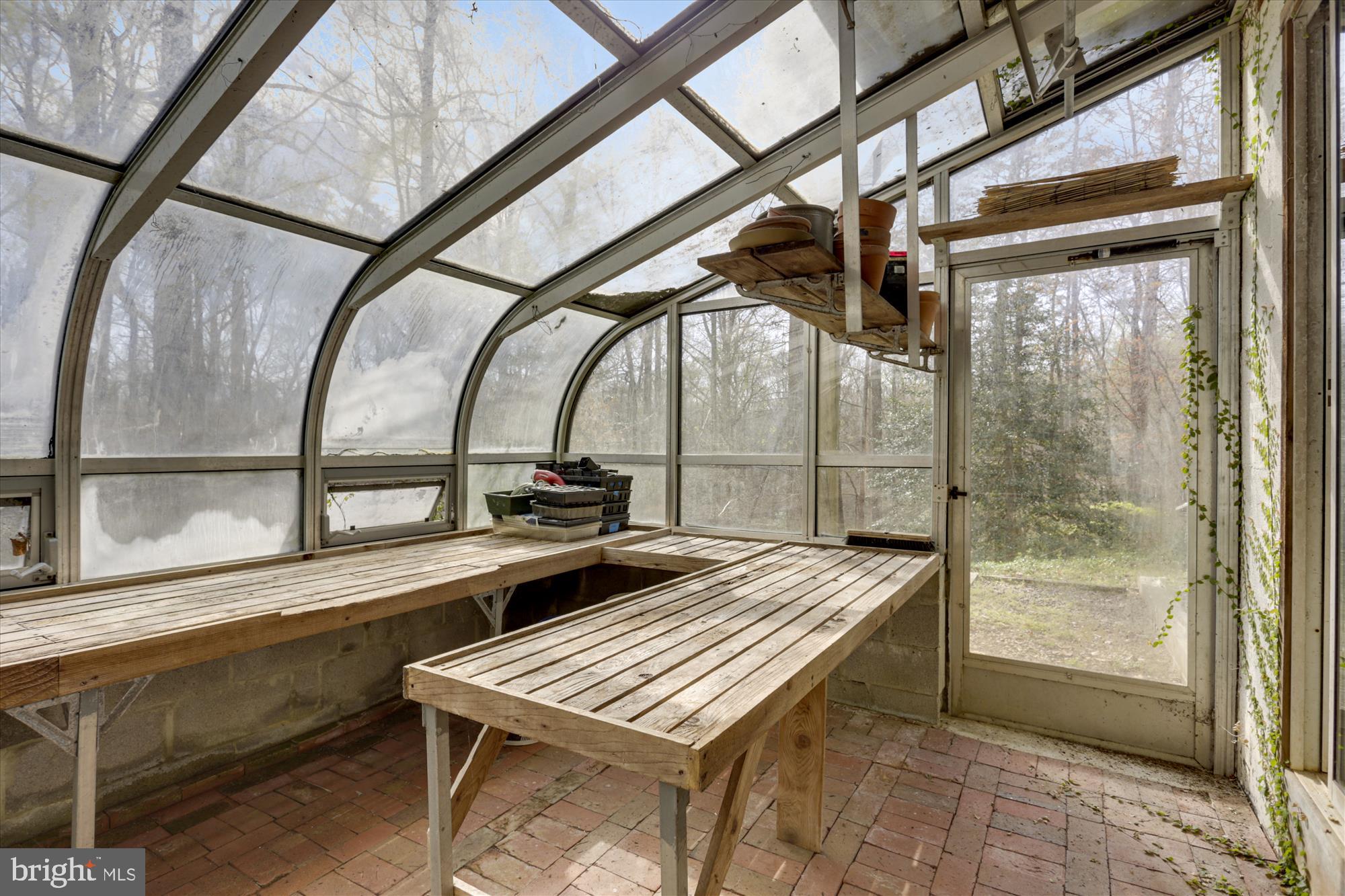 6840 Steamboat Landing Road Accokeek, MD 20607 - Photo 62 of 66 Greenhouse-accessible from outside & lower level