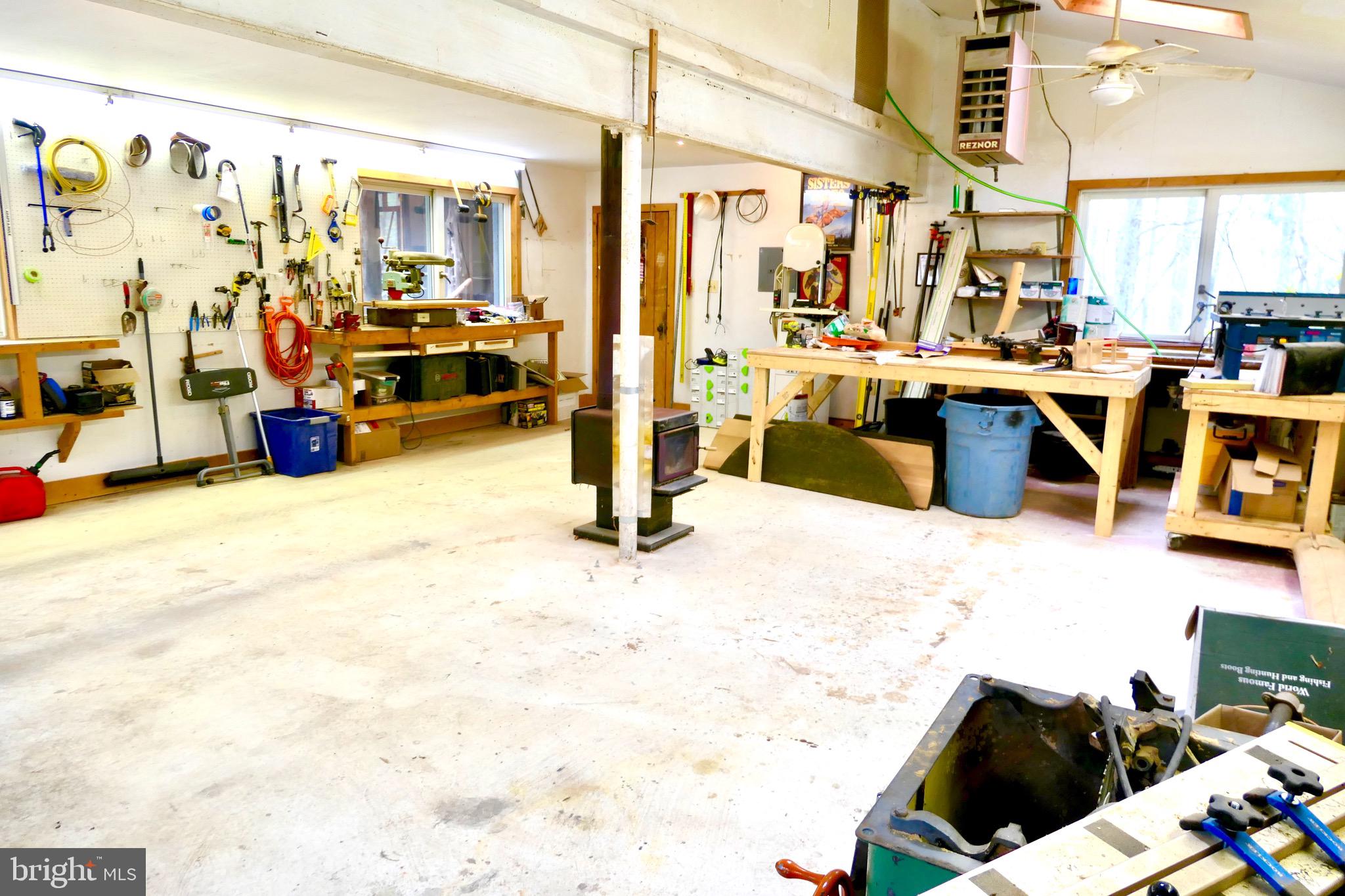 6840 Steamboat Landing Road Accokeek, MD 20607 - Photo 63 of 66 Oversized garage/shop with wood stove, heat and AC