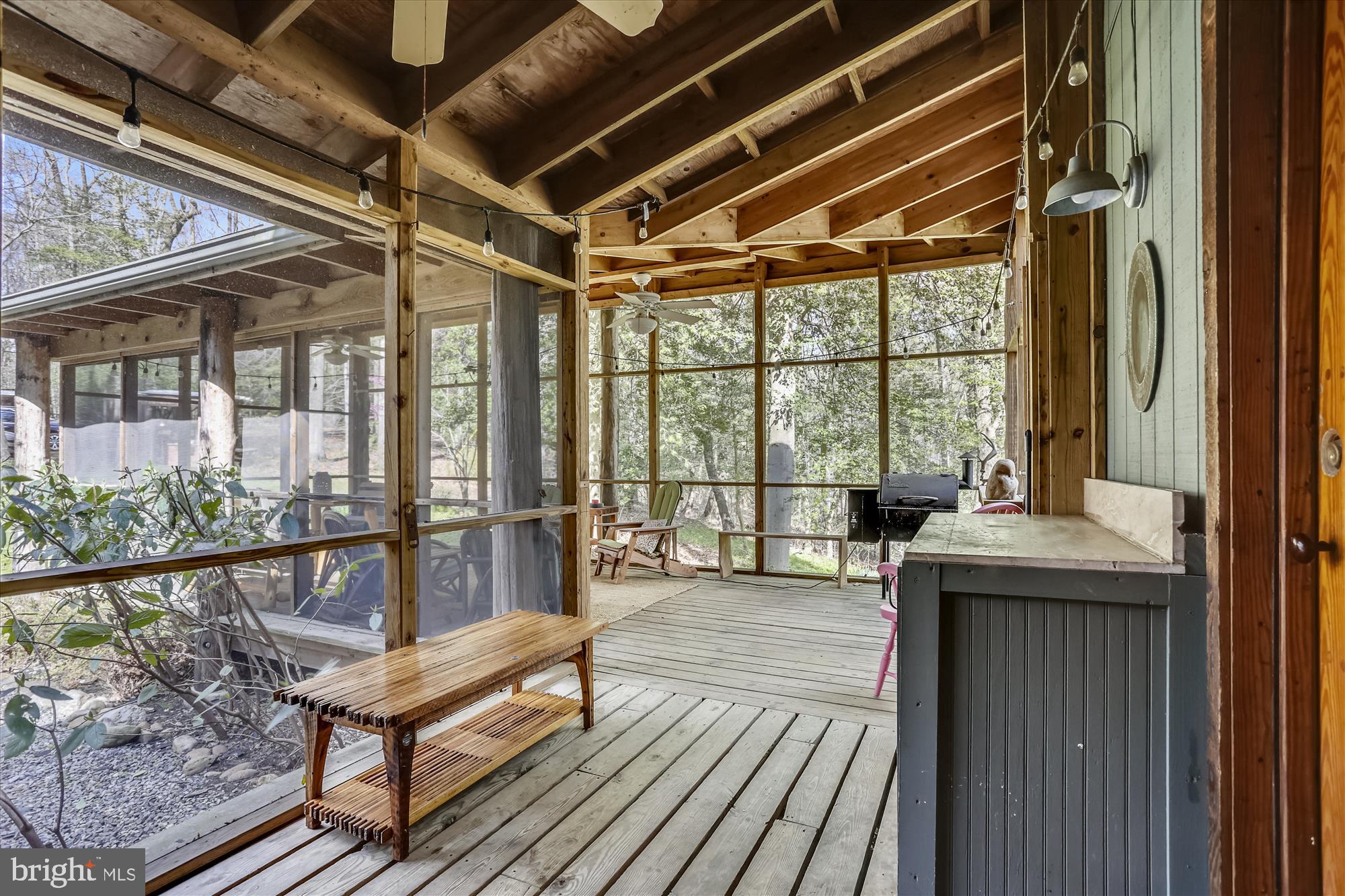 6840 Steamboat Landing Road Accokeek, MD 20607 - Photo 10 of 66 Screened porch and walkway lead into kitchen
