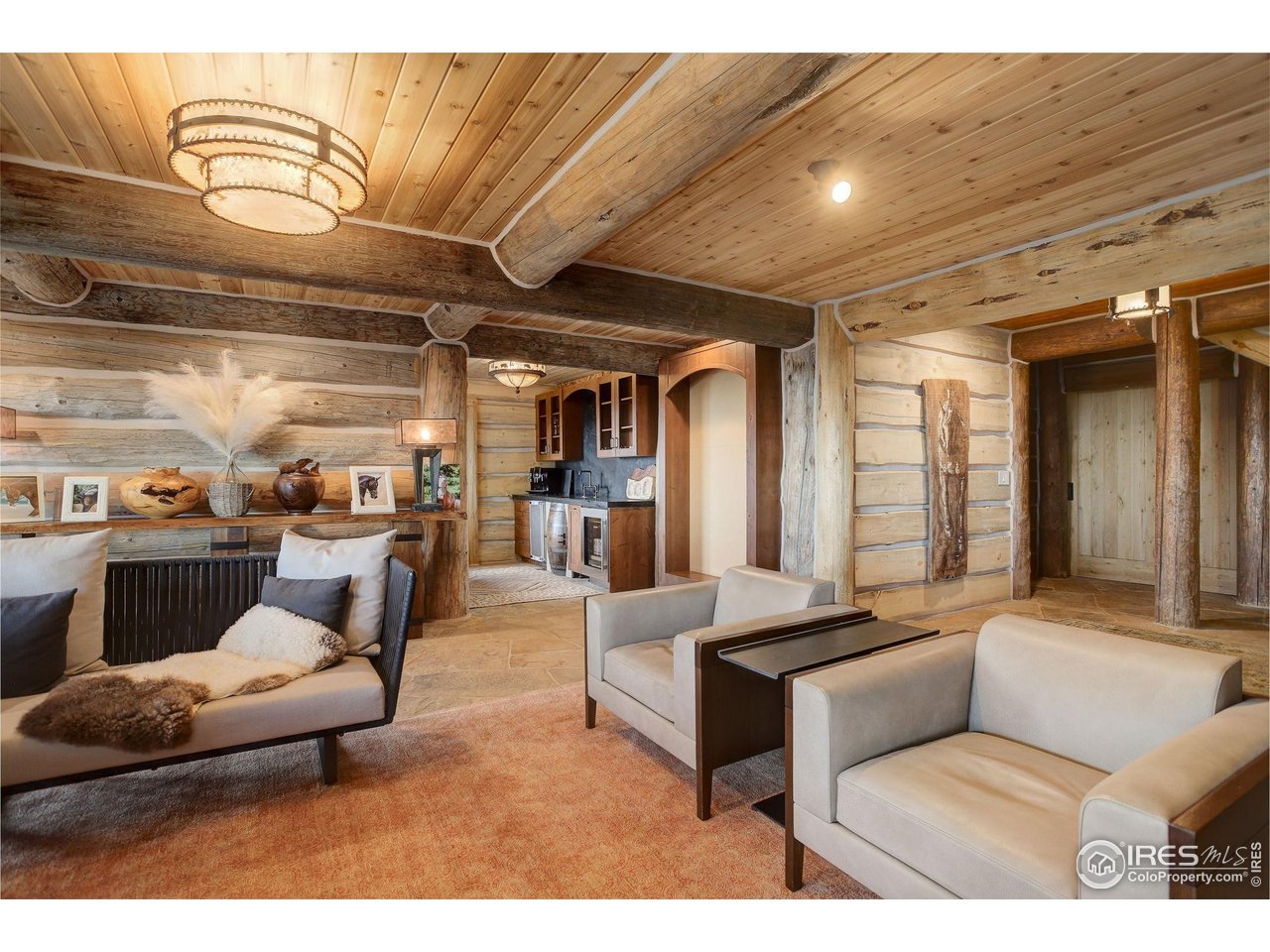 9126 Gold Mine Road Fort Collins, CO 80526 - Photo 22 of 40 a living room with furniture and a view