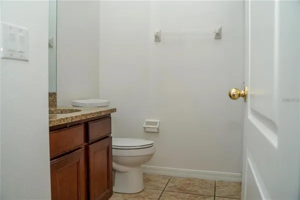 a bathroom with a toilet and a sink