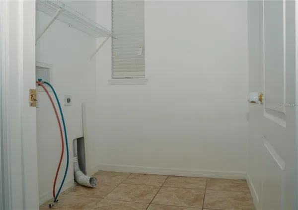 a view of a hallway with staircase