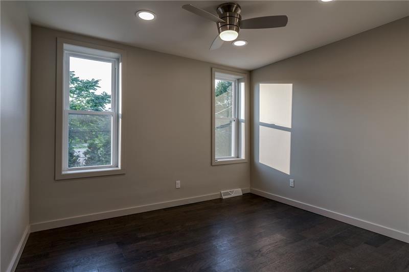 5240 Harrison Street Pittsburgh, PA 15201 - Photo 12 of 19 Photos of a renovated unit at Harrison Row. Some finishes and layouts shown may include upgrades or customizations. Work with our team to select finishes for your new home! Hardwood floors included in living room, kitchen, and bedrooms! Granite and quartz options for kitchen. SS appliances. Subway tile. Beautiful cabinetry.