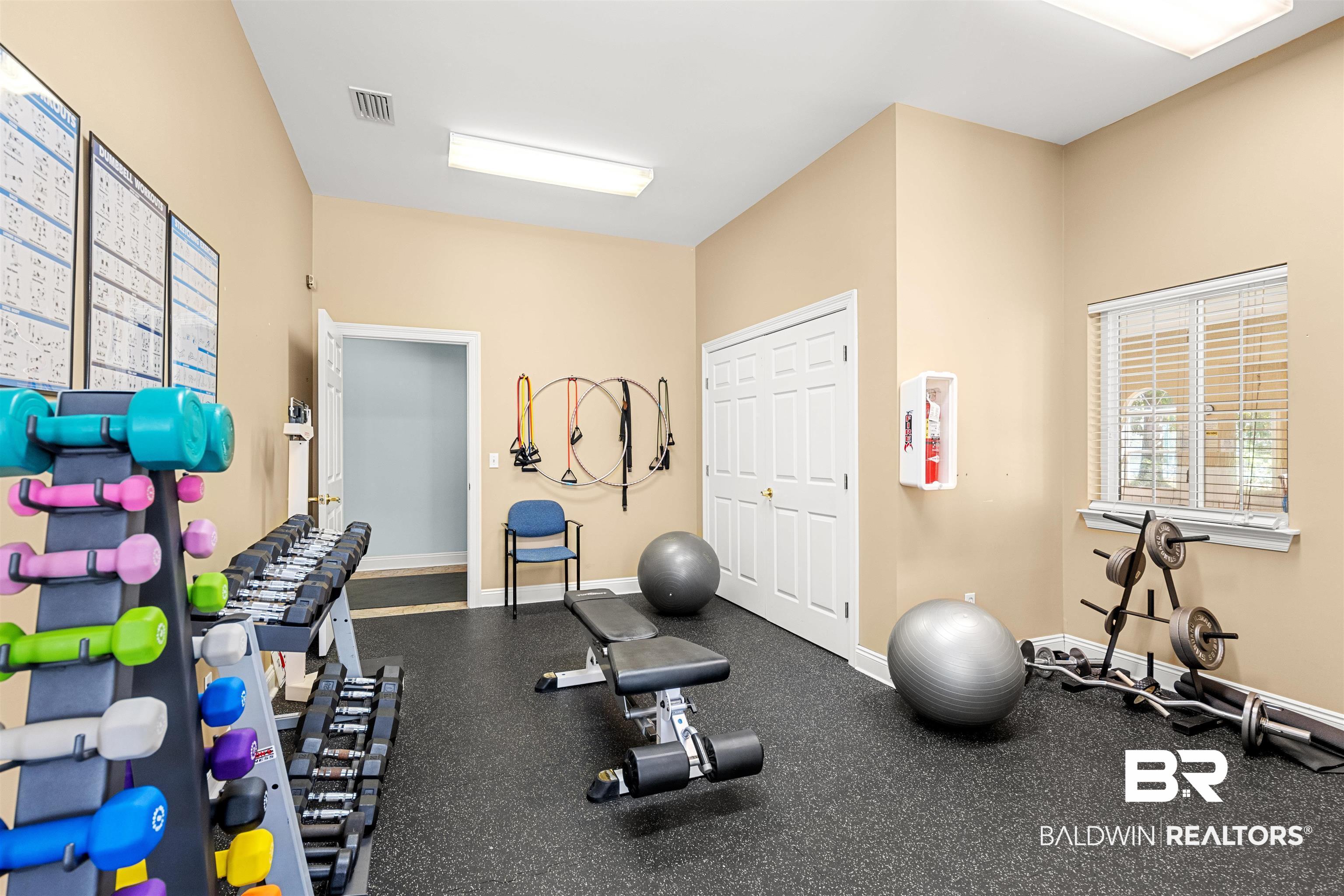 237 Hemingway Loop Foley, AL 36535 - Photo 39 of 49 Workout room featuring baseboards and visible vents