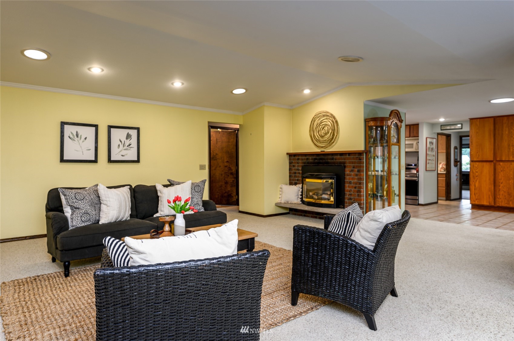 118 Sudden Valley Drive Bellingham, WA 98229 - Photo 12 of 35 a living room with furniture a large window and a fireplace