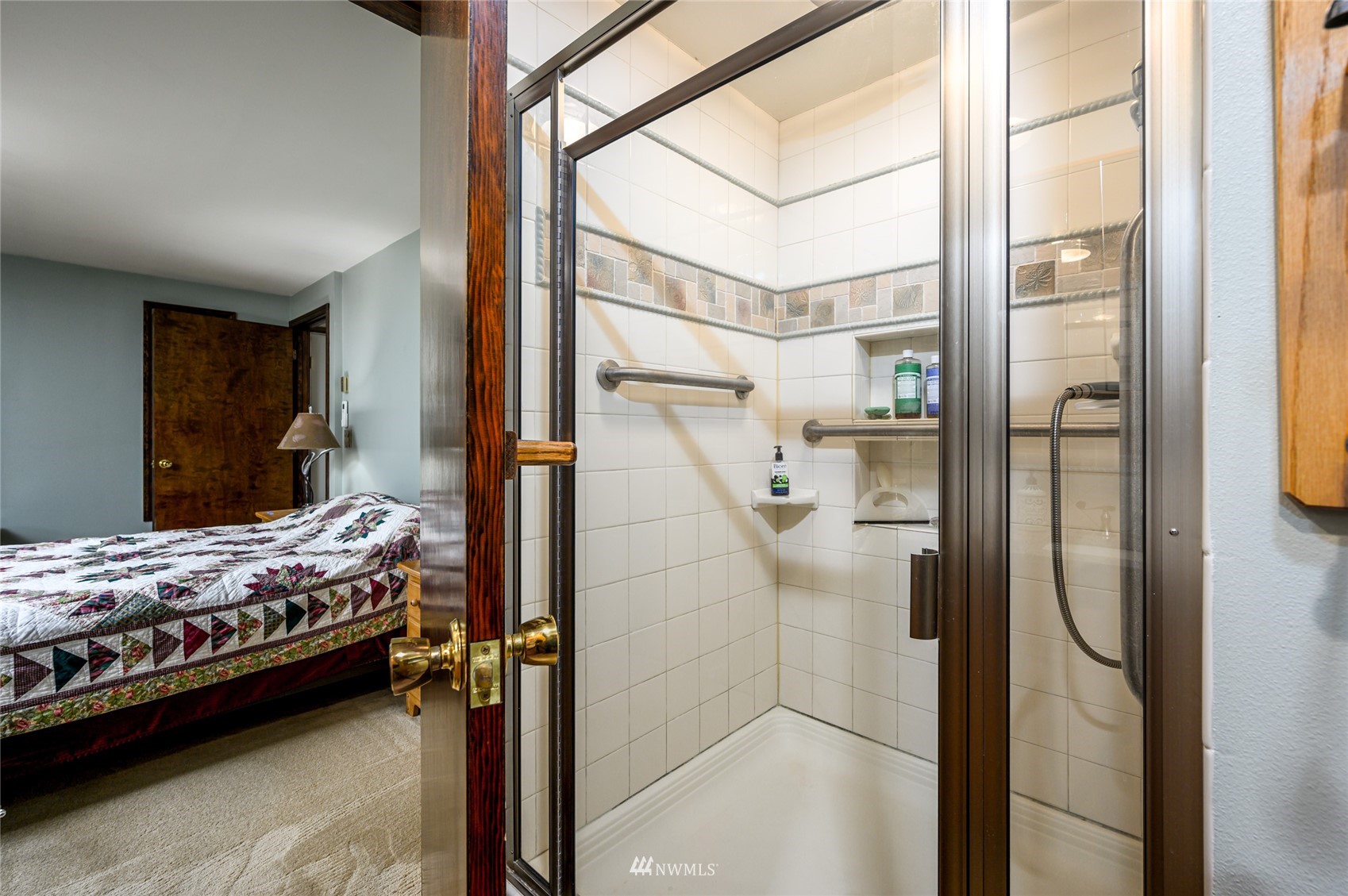 118 Sudden Valley Drive Bellingham, WA 98229 - Photo 15 of 35 a bedroom with a bed and a window