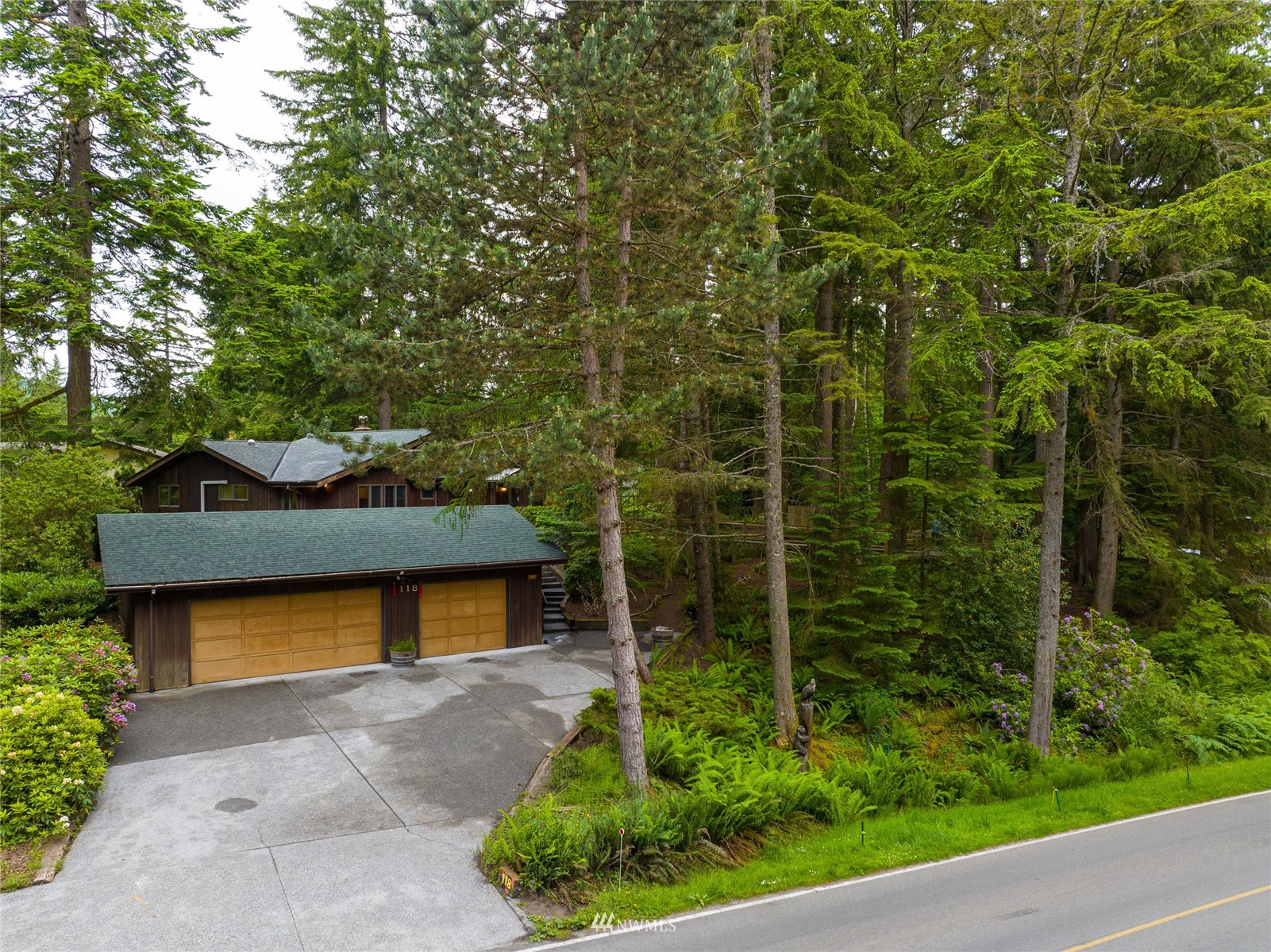 118 Sudden Valley Drive Bellingham, WA 98229 - Photo 2 of 35 a front view of a house with a yard