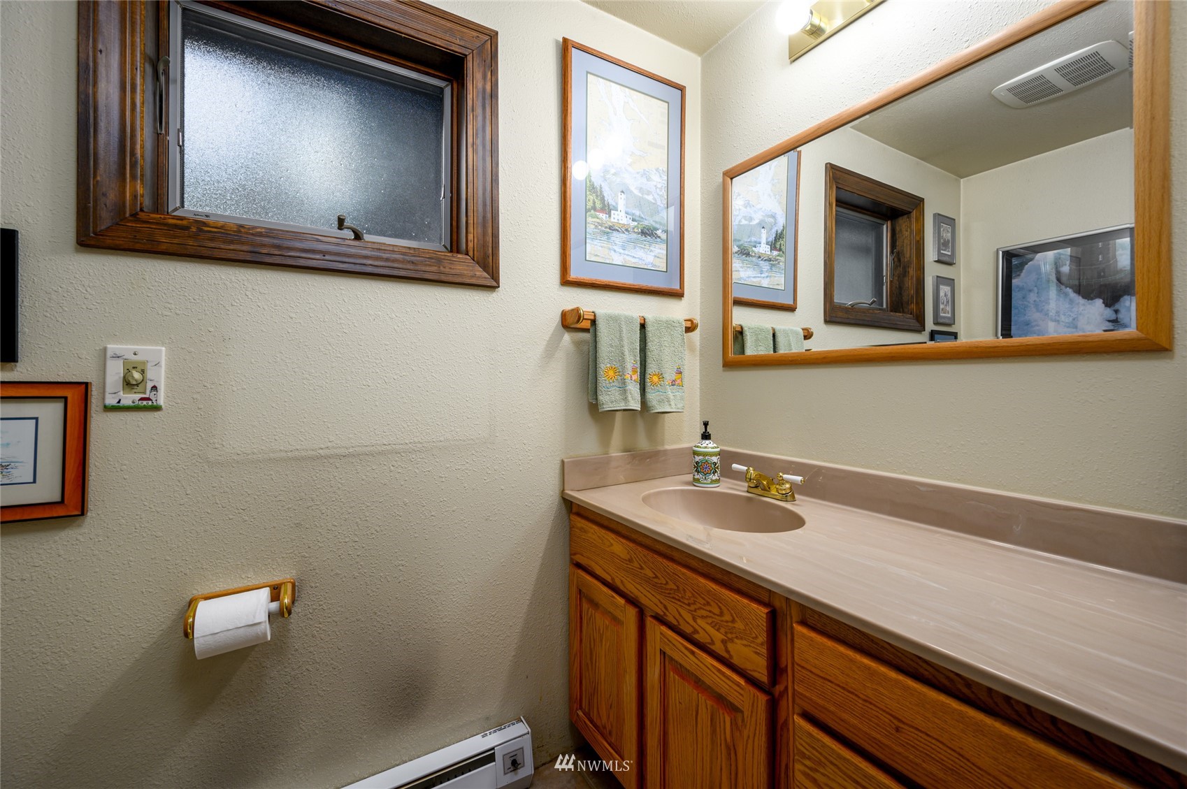 118 Sudden Valley Drive Bellingham, WA 98229 - Photo 21 of 35 a bathroom with a sink and two mirror