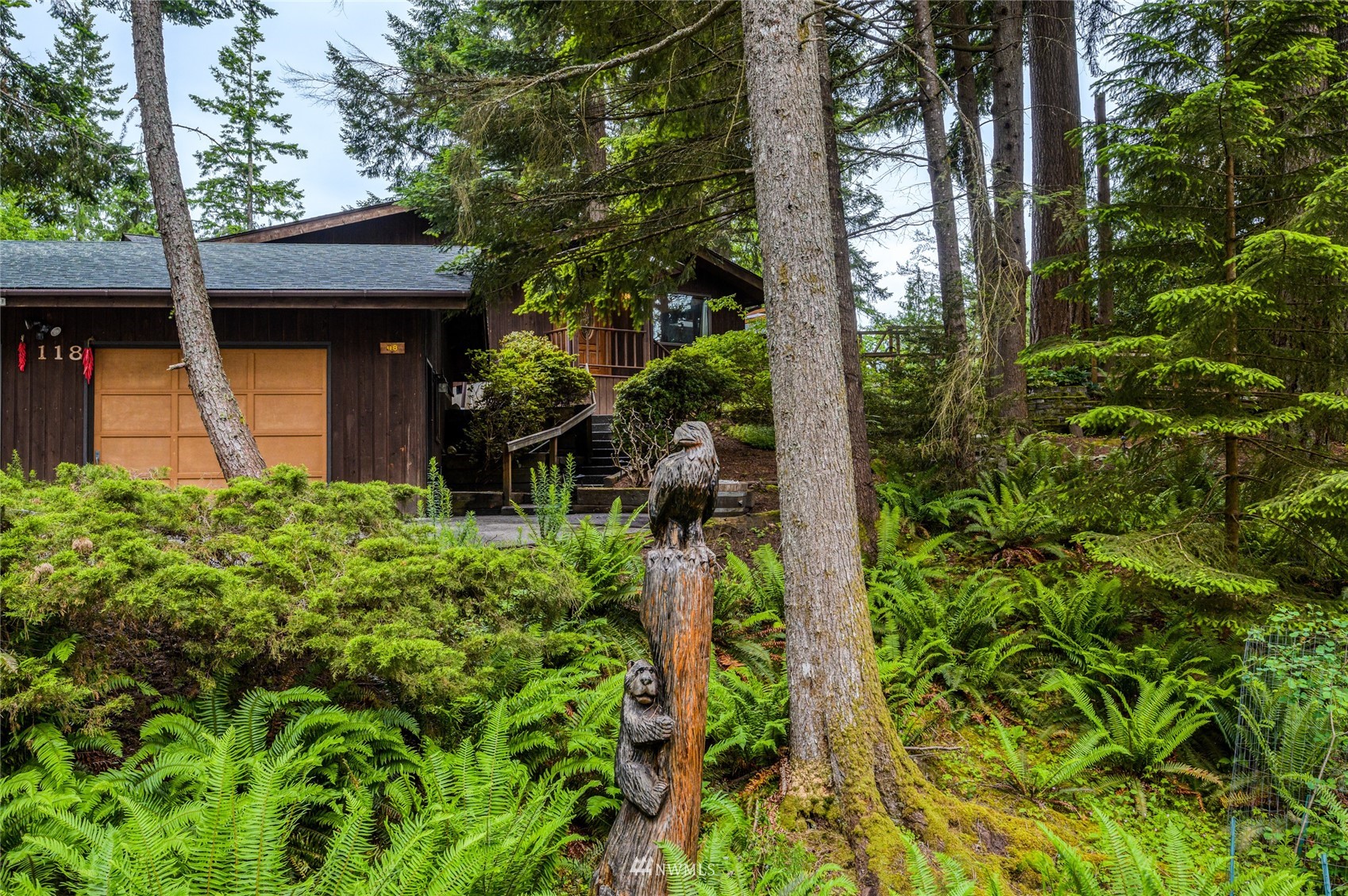 118 Sudden Valley Drive Bellingham, WA 98229 - Photo 26 of 35 a view of a pathway of a house with plants