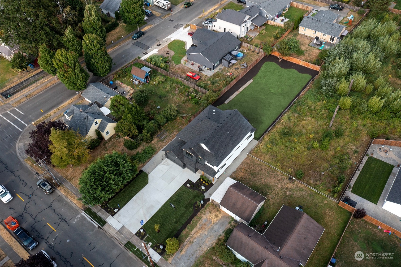 5425 Parker Road East Sumner, WA 98390 - Photo 2 of 40 an aerial view of a house with a garden